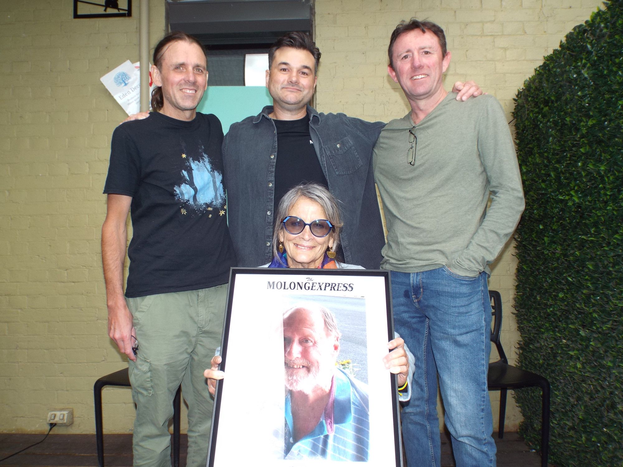 The late Paul Mullin's partner Rozzi and sons were among hundreds of people who gathered to celebrate the life of the late Molong Express publisher.